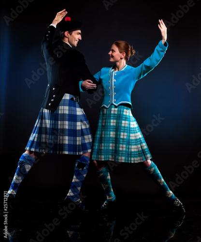 The pair dancing the Scottish dance in a kilt