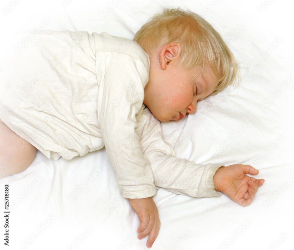 Little boy sleeping in white bedclothes Little boy sleeping in white bedclothes