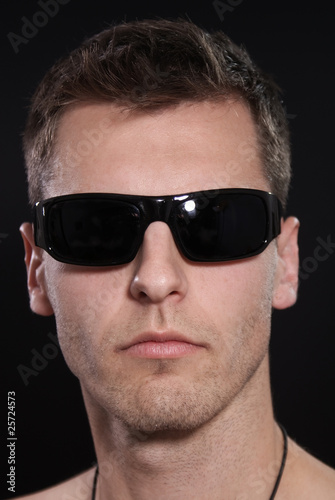 Portrait of a young man with sunglasses