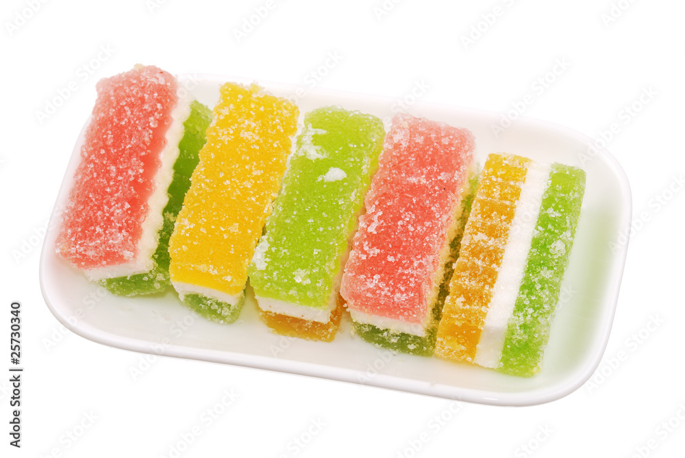 Fruit candy slices on the white Fruit candy slices on the white