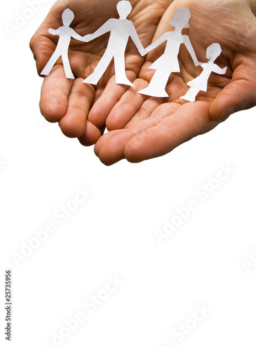 Tableau sur toile Family in the hands isolated