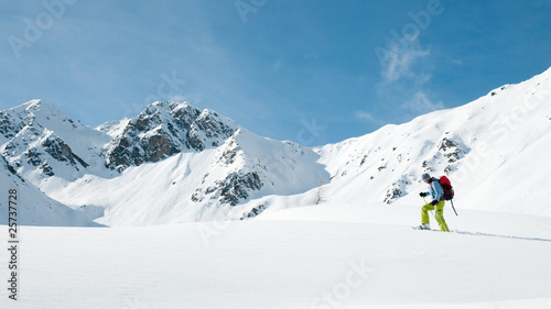 Racket trekking in snow photo
