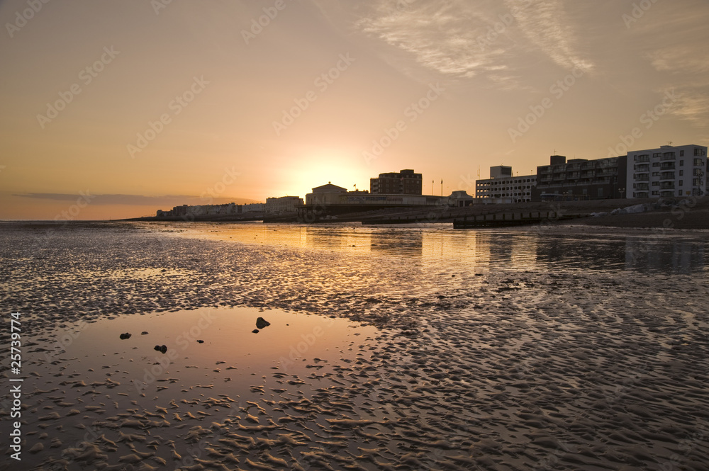 Captivating beautiful sunset over seaside town with reflections