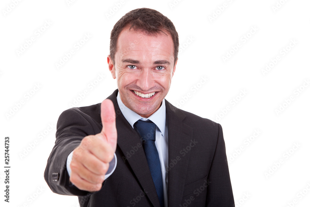andsome businessman with thumb raised as a sign of success andsome businessman with thumb raised as a sign of success