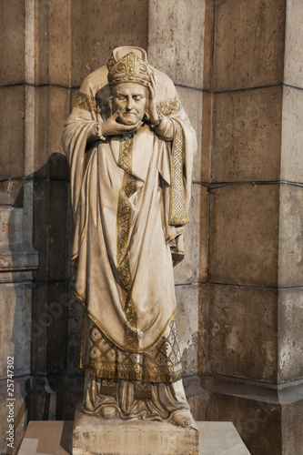 Fotografering Statue of Saint Denis beheaded, patron & first bishop of Paris