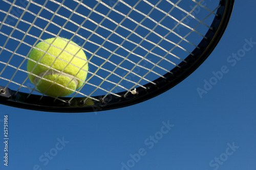Tennis Ball on the Racket © 33ft