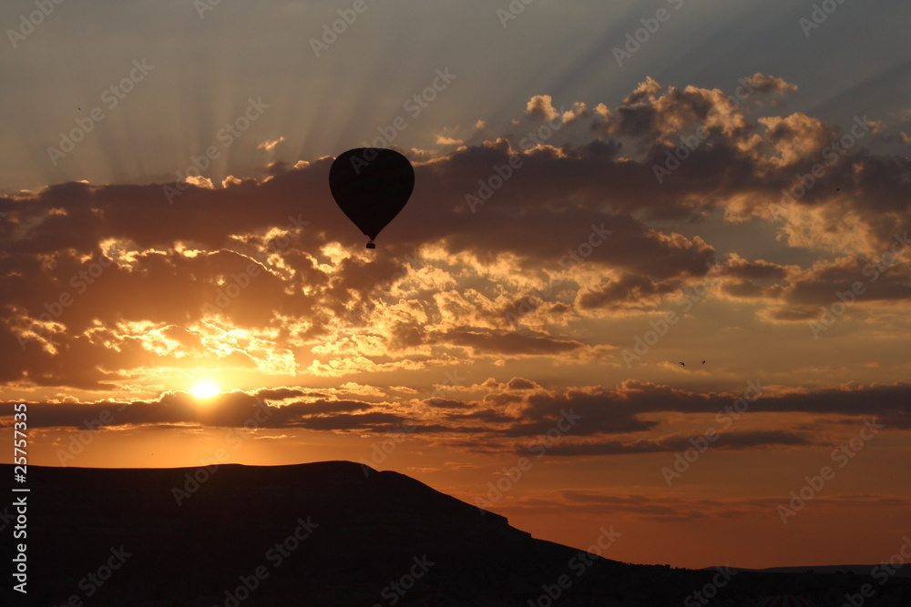 Sunrise and the balloon over Cappadocia