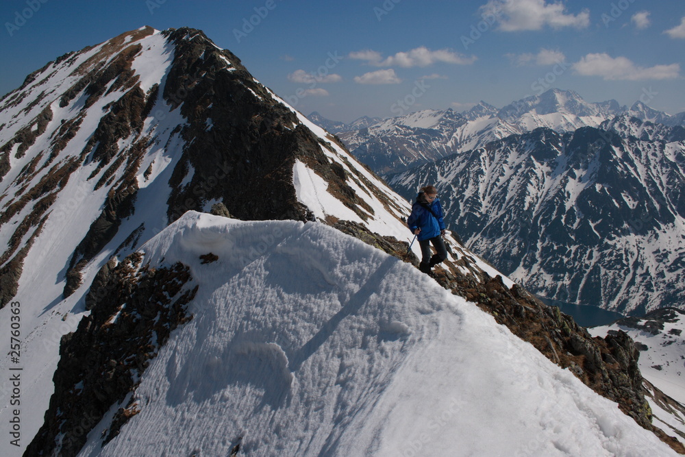 Tourist on the ridge in the Tatra Mountains, Poland