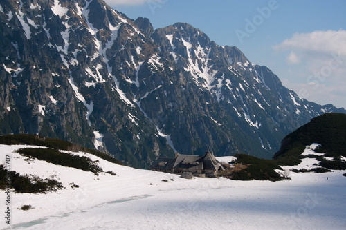 Obraz na płótnie The shelter in the Valley of five Polish Lakes in the Tatras w salonie