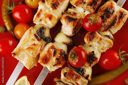roast shish kebab on red