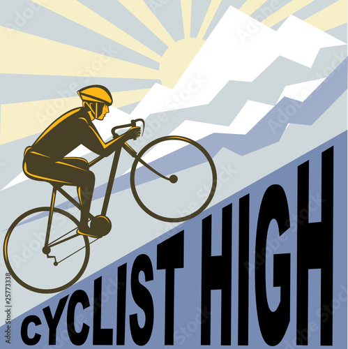 cyclist racing bike up mountain