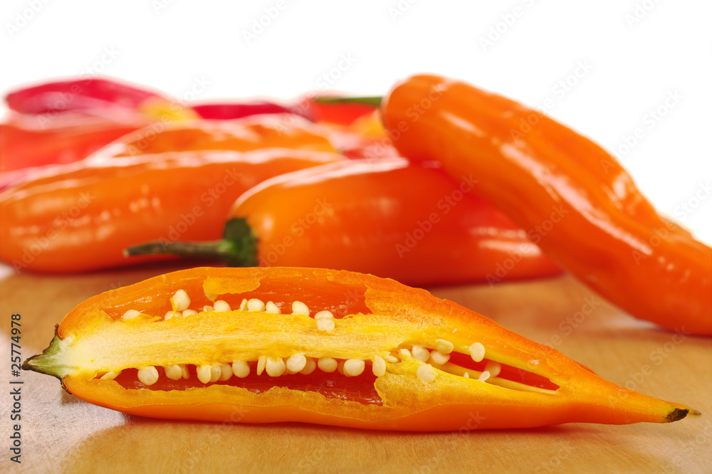 Aji, Peruvian hot pepper, on wooden board Aji, Peruvian hot pepper, on wooden board