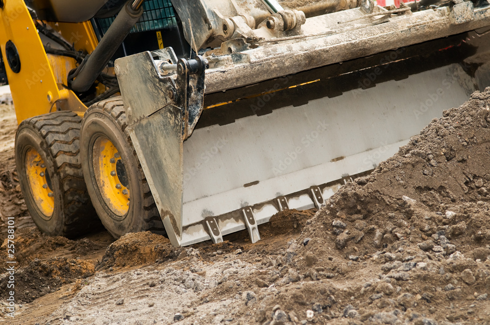 Fototapeta premium skid steer loader works