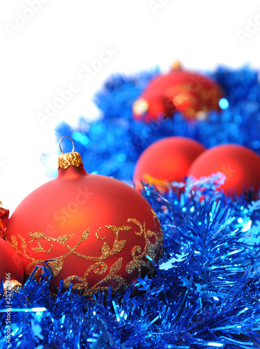 Red christmas balls on blue chains