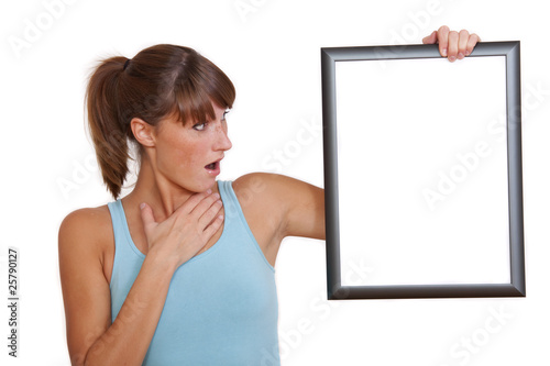 surprised woman with picture frame