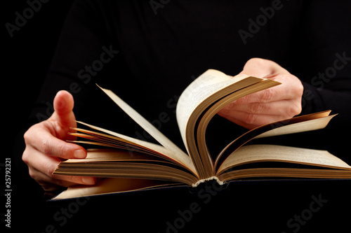 Looking thruogh book with motion blur