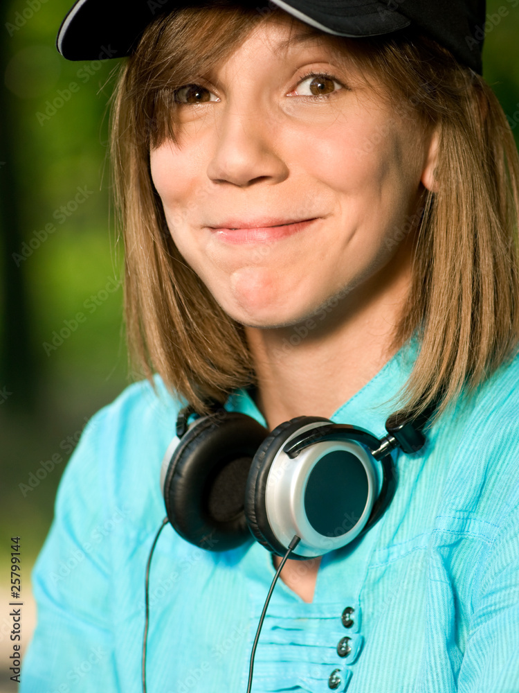 Fototapeta premium Teenage girl with headphones