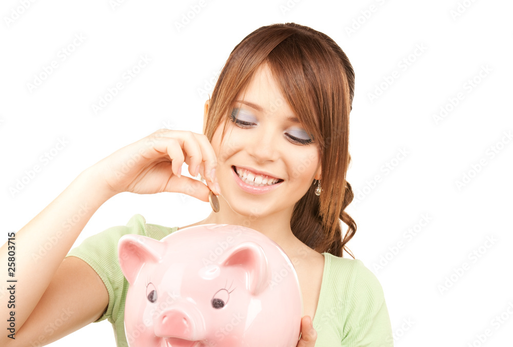 lovely teenage girl with piggy bank and coin lovely teenage girl with piggy bank and coin