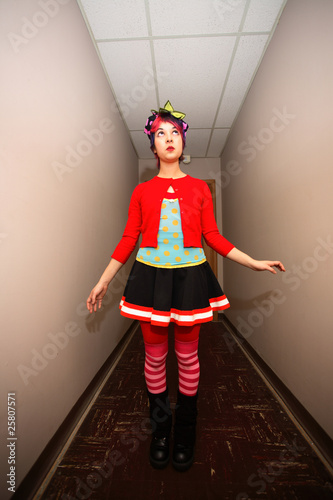 Colorful girl in hallway photo