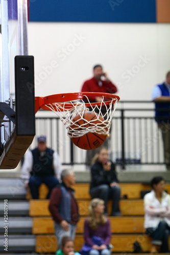 Basketball through net © Peter Kim
