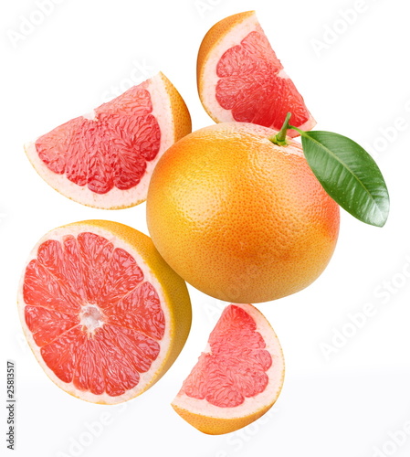 Falling grapefruit and grapefruit slices.