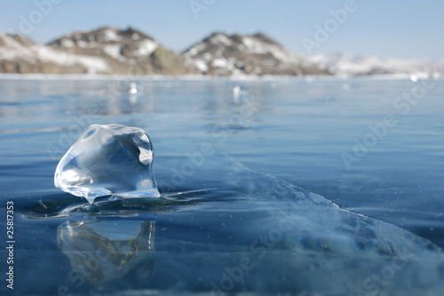 Piece of ice on the frozen lake
