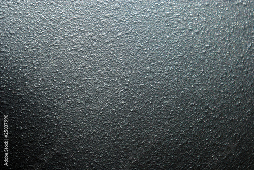 Black abrasive surface of the plastic close-up