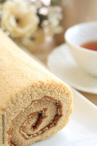 Coffe rollcake with English tea photo