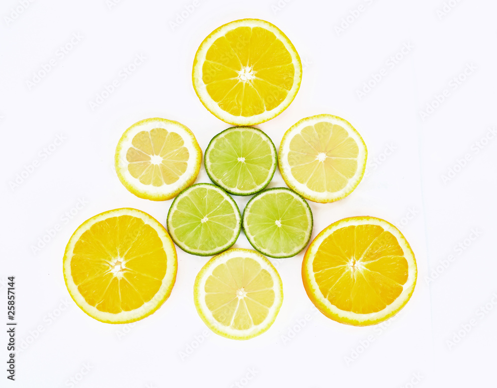 composition of slices of orange, lime and lemon on white