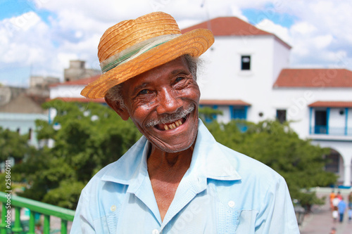 Old sympathetic cuban man with straw hat ,  Cuba photo