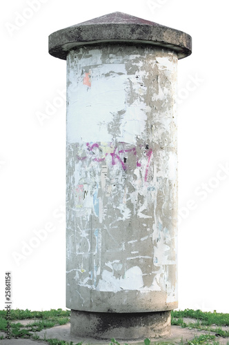 Grunge concrete advertising pillar and grass isolated on white