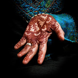 Henna, mehendi on a bride's hand - fun square