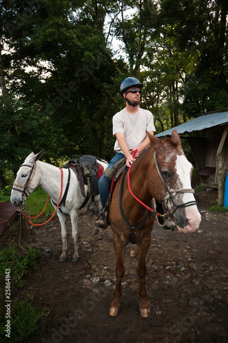European or American man on horseback in Costa Rica