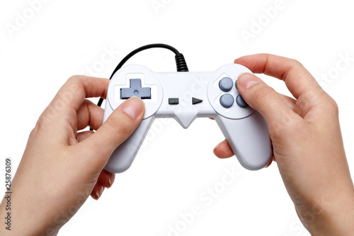 white game controller in hand isolated on white background