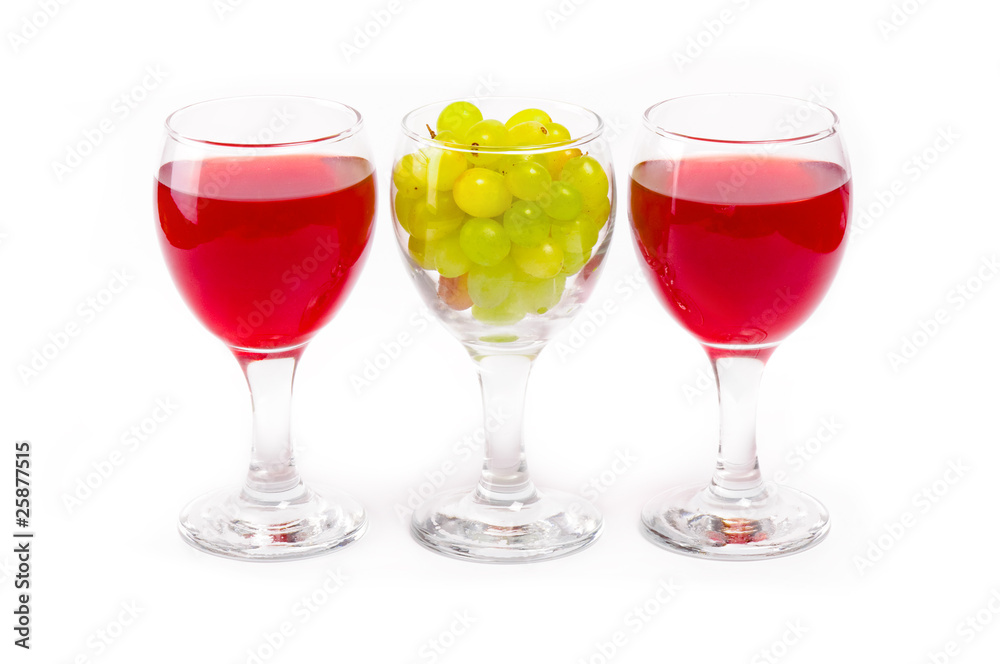 Arrangement of glasses of wine and grapes Arrangement of glasses of wine and grapes