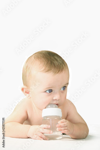 baby drinking water form bottle
