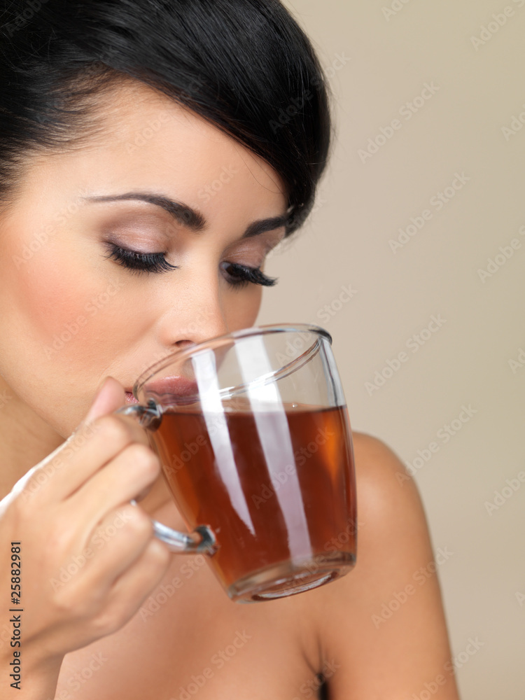 Portrait of beautiful woman, she holding cup of tea Portrait of beautiful woman, she holding cup of tea