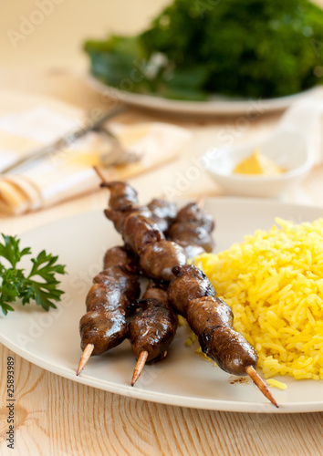 Grilled chicken hearts with turmeric rice