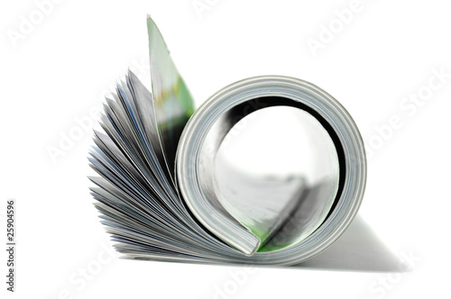 Roll of magazine isolated on white background