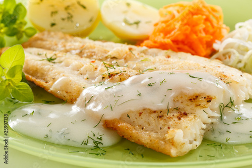 Photography Fish dish - fried fish fillet with vegetables