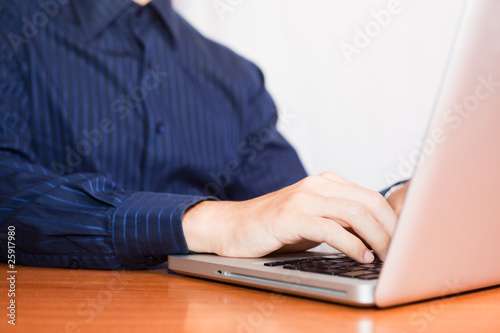 Businessman Typing on Computer Keyboard