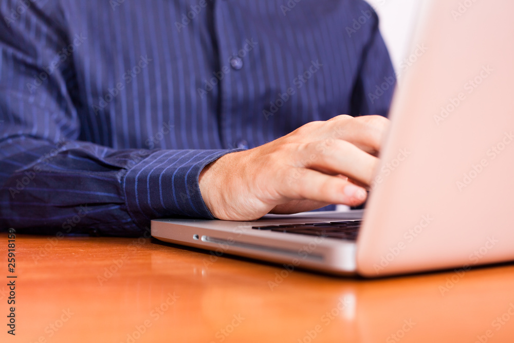 Businessman Typing on Computer Keyboard Businessman Typing on Computer Keyboard