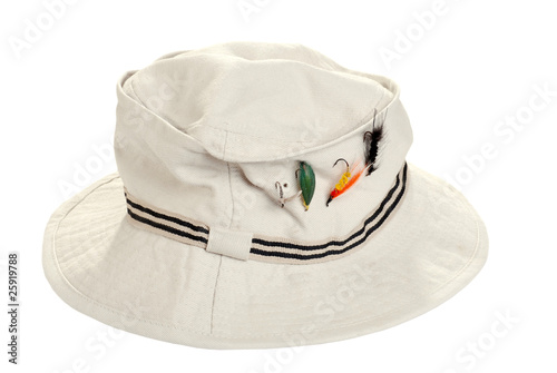 fishing kahki hat with dry flies photo
