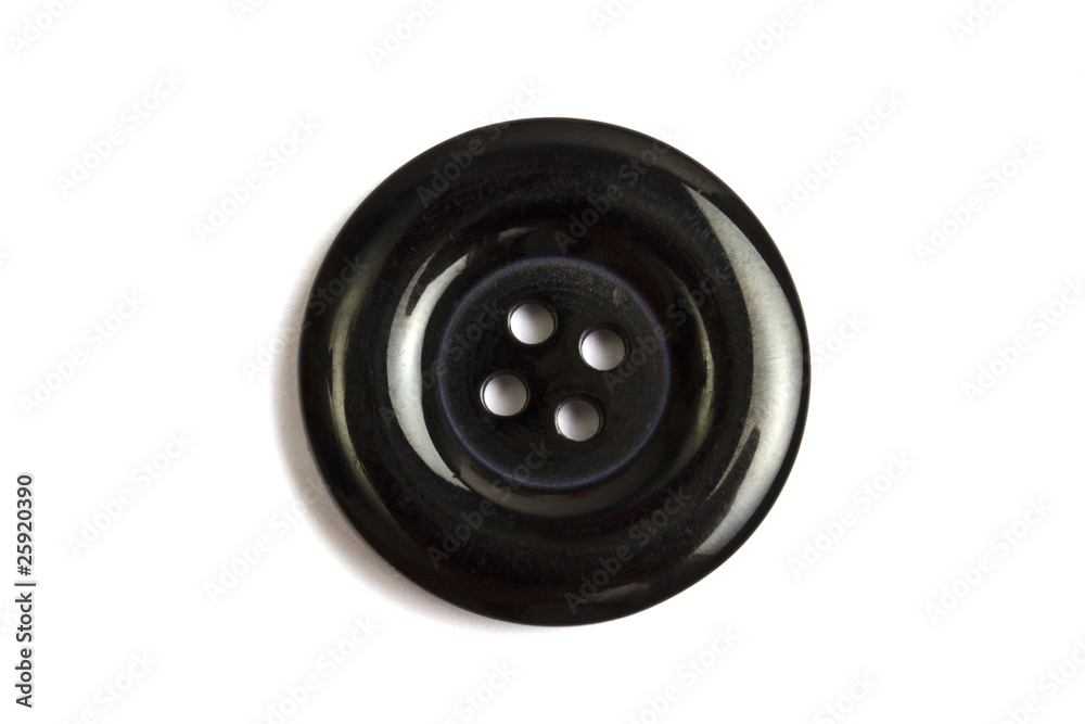 Black clothing button isolated on white Black clothing button isolated on white