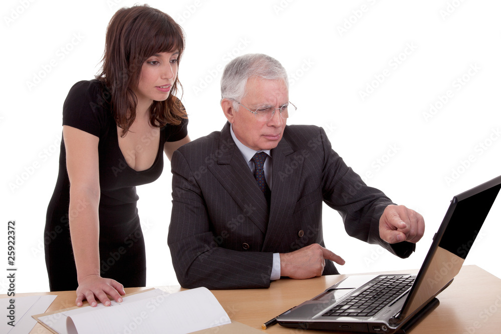 businessman and woman discussing, pointing to computer businessman and woman discussing, pointing to computer