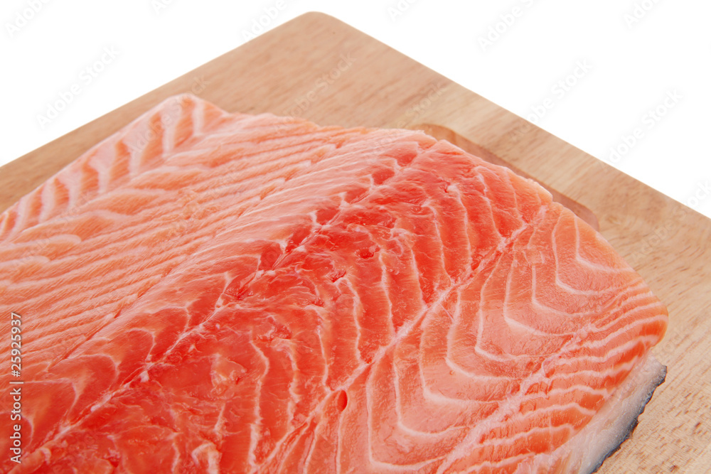 fresh raw salmon fillet on wood