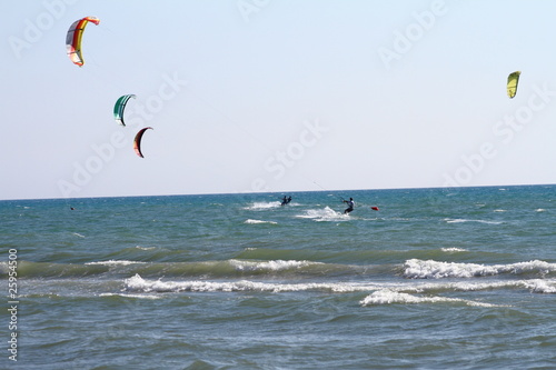 Parachute of kitesurfers on Tyrrhenian sea