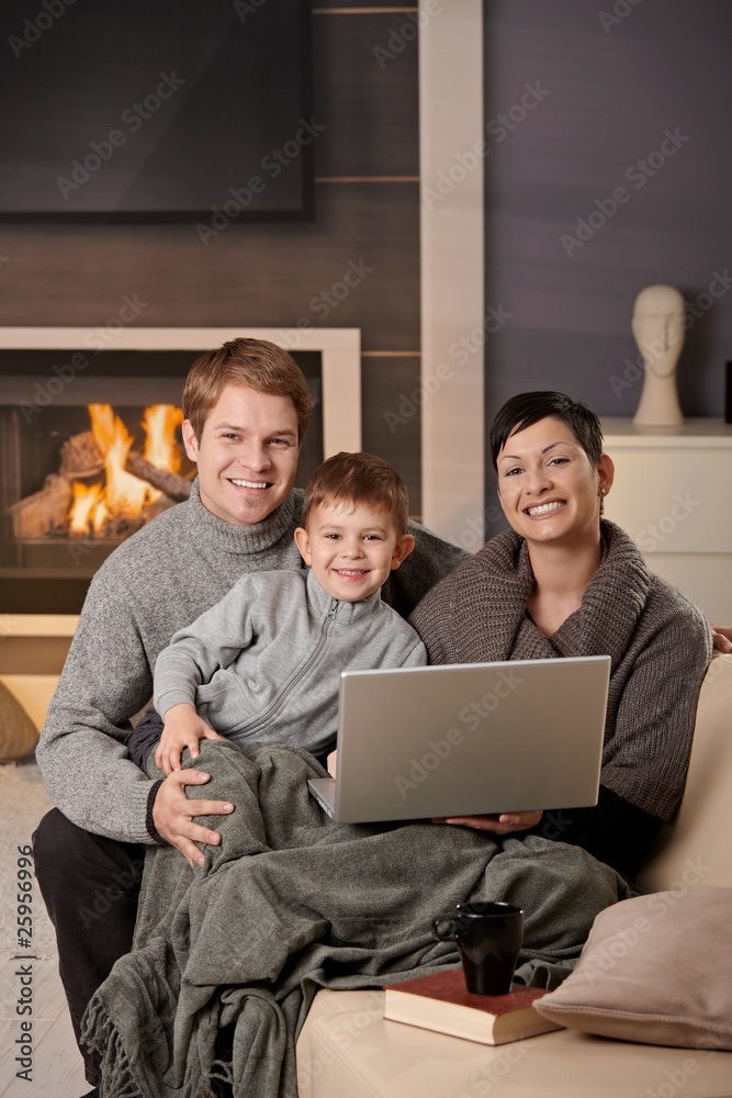 Happy family with computer Happy family with computer