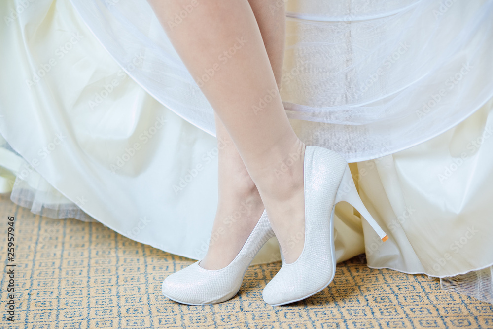 closeup photo of beautiful bride's shoes closeup photo of beautiful bride's shoes