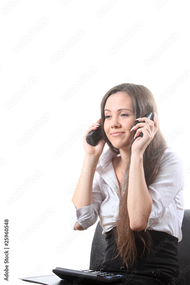 Businesswoman speak by two phones and smile Businesswoman speak by two phones and smile